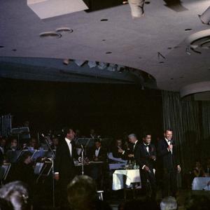 Frank Sinatra, Dean Martin and Sammy Davis Jr. performing circa 1960