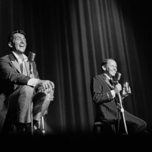 Frank Sinatra and Dean Martin performing at a Share Party circa 1963