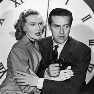 Still of Ray Milland and Rita Johnson in The Big Clock 1948