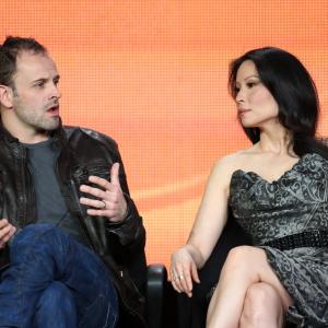 Jonny Lee Miller and Lucy Liu at event of Elementaru 2012
