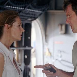 Towns (Dennis Quaid) and Kelly (Miranda Otto) try to make sense out of their dire predicament.