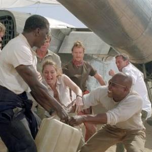 The surviving passengers of a downed plane lost in the Mongolian desert struggle for their most precious commodity water Pictured left to right are Scott Michael Campbell as Liddle Tyrese Gibson as AJ Miranda Otto as Kelly Dennis Quaid as Towns Tony Curran as Rodney Kirk Jones as Jeremy and Hugh Laurie as Ian