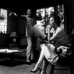 Jack Palance and his wife, Virginia, helping him rehearse at home in Beverly Hills, CA, 1954.