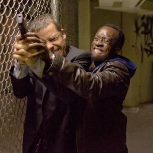Still of Don Cheadle and Guy Pearce in Isdavikas (2008)