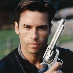 Guy Pearce with the engraved Colt 1873 Revolver used in Snowy River: The McGregor Saga, this revolver is one of a pair of engraved 1873 Colts that were used on the set.