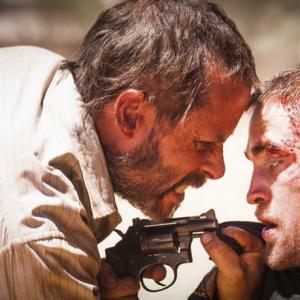 Still of Guy Pearce and Robert Pattinson in The Rover (2014)