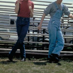 Still of Kevin Bacon and Chris Penn in Footloose 1984