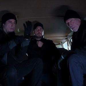 Still of John Travolta Christopher Plummer and Travis Aaron Wade in The Forger 2014