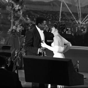 Best Actor Sidney Poitier Lilies of the Field accepts his Oscar from Anne Bancroft 36th Academy Awards