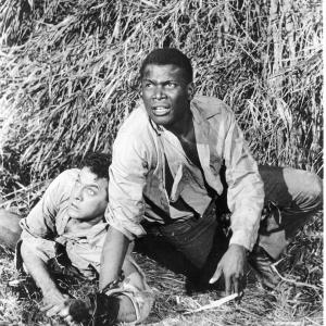 Still of Tony Curtis and Sidney Poitier in The Defiant Ones 1958