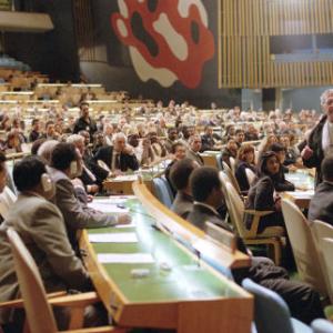 DirectorExecutive Producer SYDNEY POLLACK on the floor of the General Assembly during filming of The Interpreter a suspenseful thriller of international intrigue set inside the political corridors of the United Nations and on the streets of New York