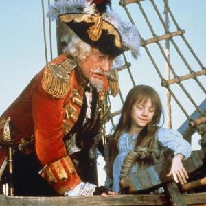 Still of Sarah Polley and John Neville in The Adventures of Baron Munchausen (1988)