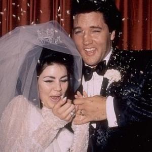 Elvis Presley and his bride, the former Priscilla Ann Beaulieu, at their wedding in Las Vegas, 5/26/67.