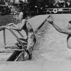 Ronald Reagan and wife Jane Wyman in their pool C 1940