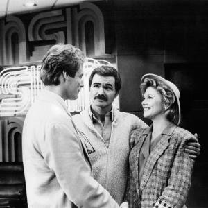 Still of Burt Reynolds, Kathleen Turner and Christopher Reeve in Switching Channels (1988)