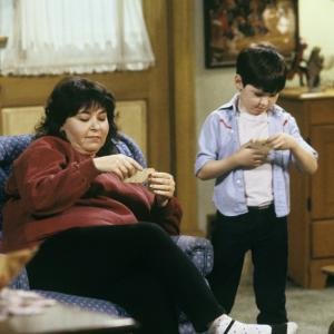 Still of Roseanne Barr and Michael Fishman in Roseanne 1988