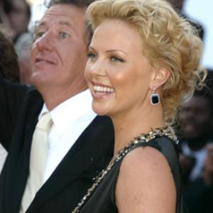 Charlize Theron and Geoffrey Rush at event of The Life and Death of Peter Sellers 2004