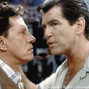 Harry Pendel (Geoffrey Rush, left), a Cockney ex-con turned popular tailor to the rich and powerful of Panama, is preyed upon by ruthless, charming British spy Osnard (Pierce Brosnan)