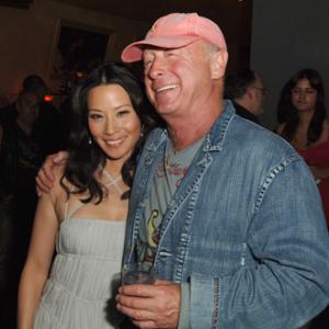 Tony Scott and Lucy Liu at event of Domino (2005)