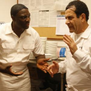 Still of Tony Shalhoub and Adewale AkinnuoyeAgbaje in Monk 2002