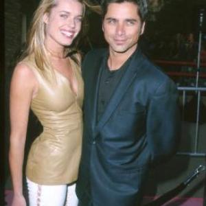 John Stamos and Rebecca Romijn at event of Austin Powers The Spy Who Shagged Me 1999