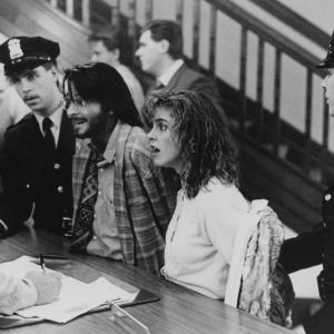 Still of Cynthia Gibb and Fisher Stevens in Short Circuit 2 (1988)