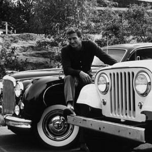 Rod Taylor with his Jaguar Sedan and Jeep
