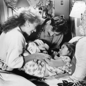 Still of Tom Selleck Nancy Travis and Robin Weisman in 3 Men and a Little Lady 1990