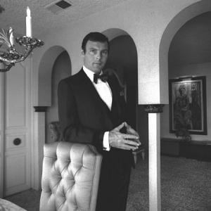 Adam West at home for a GQ layout, 1966