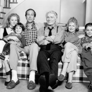 Still of Chevy Chase, Jack Palance, Dianne Wiest, Miko Hughes, Fay Masterson and Jason James Richter in Cops and Robbersons (1994)