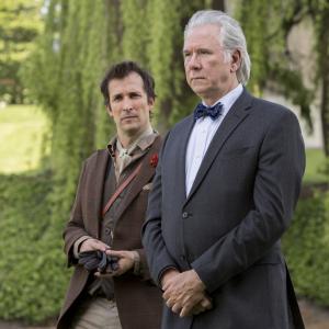 Still of Noah Wyle and John Larroquette in The Librarians 2014