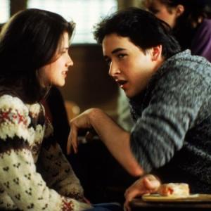 Still of John Cusack and Daphne Zuniga in The Sure Thing 1985