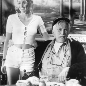 Still of Kirk Douglas and Olivia dAbo in Greedy 1994