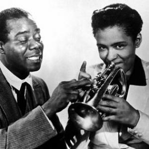 Louis Armstrong with Billie Holiday Dec. 1947.