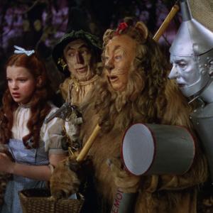 Still of Judy Garland Ray Bolger Jack Haley and Bert Lahr in The Wizard of Oz 1939