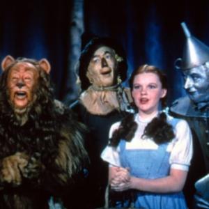 Still of Judy Garland Ray Bolger Jack Haley and Bert Lahr in The Wizard of Oz 1939