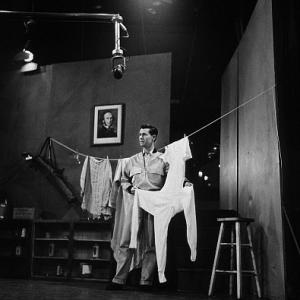 Johnny Carson hanging laundry on stage 1953