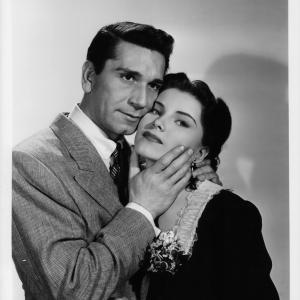 Still of Richard Conte and Debra Paget in House of Strangers 1949