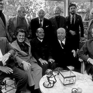 Directors Group Nov1972 George Cukor Hosts a party for Luis Bunuel Back Row from left Robert Mulligan William Wyler George Cukor Robert Wise JeanClaude Carriere and Serge Silverman Front Row from left Billy Wilder George Stevens Luis Bunuel Alfred Hitchcock and Rouben Mamoulin