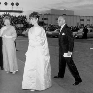 Academy Awards 37th Annual Audrey Hepburn and George Cukor arrive for the award ceremony 1965