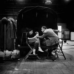 Director George Cukor with Judy Garland on the set of 
