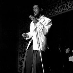 Sammy Davis, Jr. performing at Ciro's Nightclub, circa 1957. Modern silver gelatin, 14x11. $600 © 1978 David Sutton MPTV