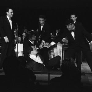 Frank Sinatra, Sammy Davis Jr., Dean Martin, Peter Lawford, Buddy Lester and Joey Bishop performing in the Copa Room at the Sands Hotel in Las Vegas