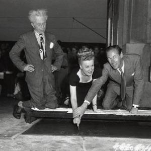 Irene Dunne, Rex Harrison and Sid Grauman at the Chinese Theatre Handprint Ceremony