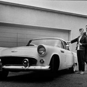 Audrey Hepburn and Mel Ferrer with their 1956 T Bird at home in Beverly Hills