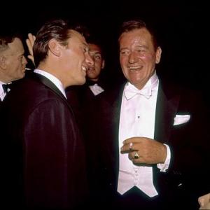 Academy Awards 32nd Annual John Wayne  Laurence Harvey at Beverly Hilton 1960