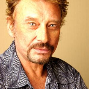 Johnny Hallyday at event of Lhomme du train 2002