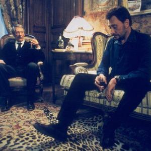 Still of Johnny Hallyday and Jean Rochefort in Lhomme du train 2002