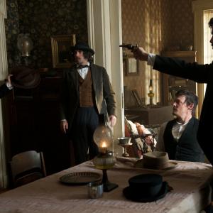As George Atzerodt in this photo still from The Conspirator. (L to R Johnny Simmons, John Michael Weatherly, Toby Kebbell)