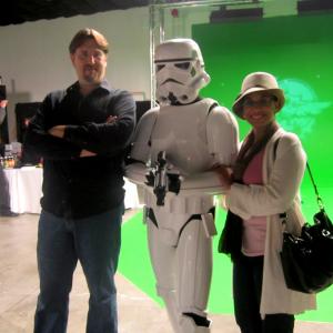 C Andrew Nelson and his wife Veronica Loud pose with a stormtrooper on the greenscreen stage at the grand opening of Athena Studios in Emeryville CA